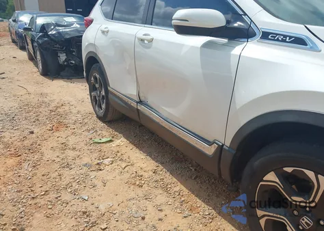 2017 Honda Cr-V Touring z USA, uszkodzony, nr VIN 5J6RW2H91HL068283